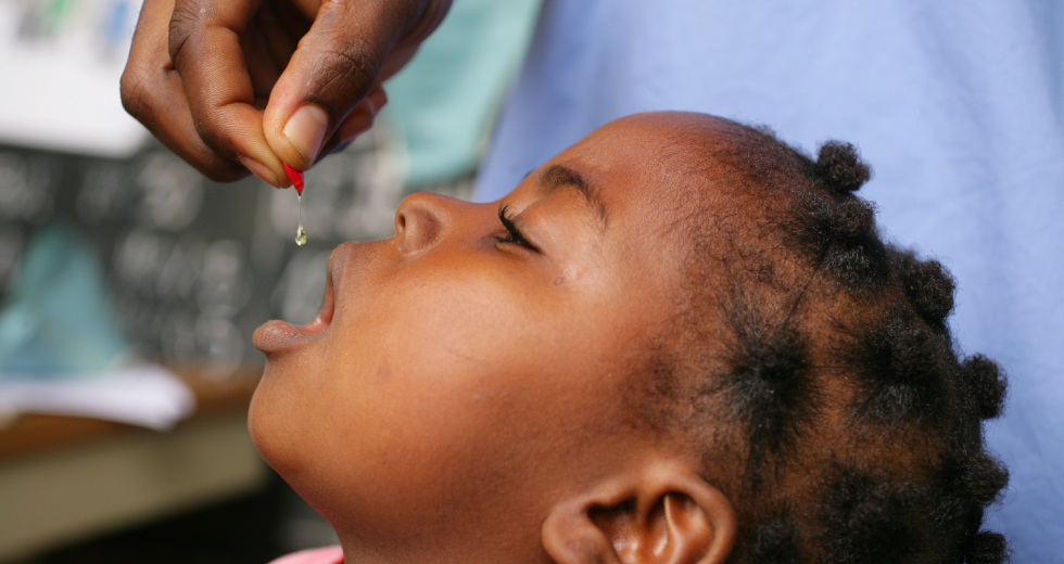 child taking vaccination
